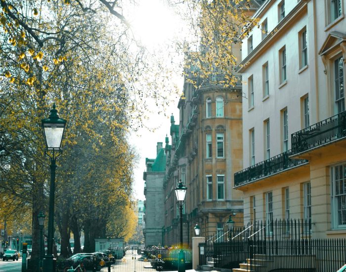 A sunny day in London's iconic streets, showcasing classic architecture.
